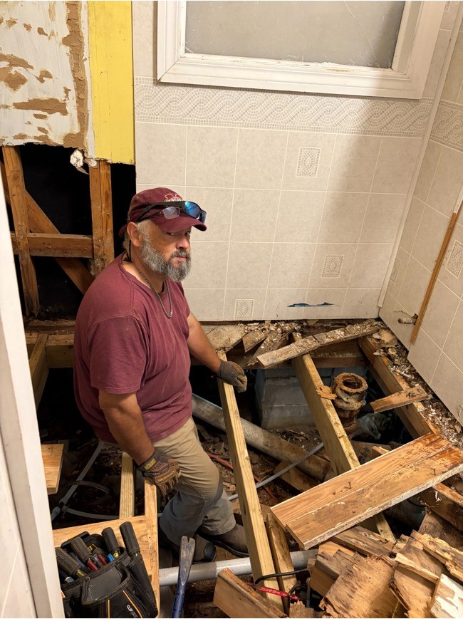 Glenn Newell working on an interior renovation and repair project